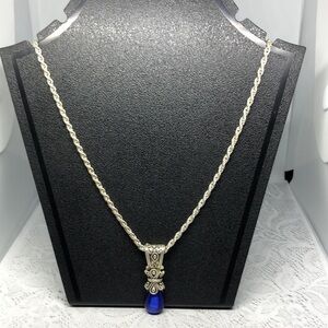Antique style pendant necklace with blue faux gemstone